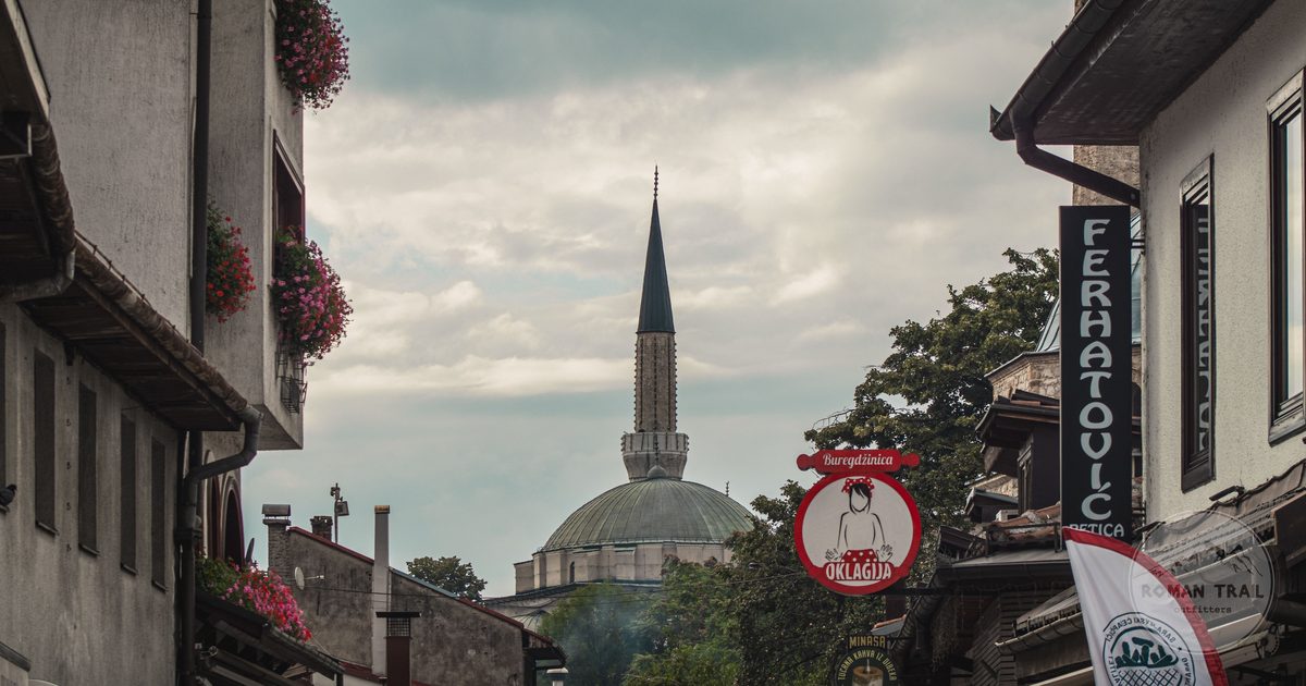A Sarajevo street with a historic mosque behind it, Bosnia and Herzegovina