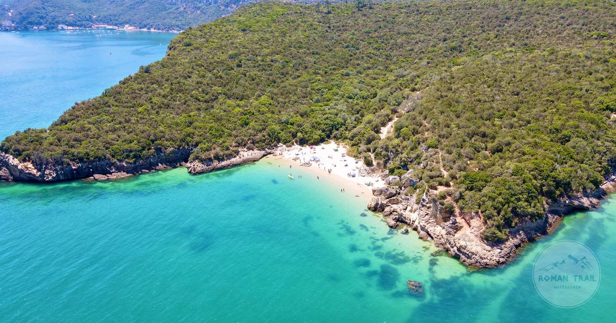 Turquoise water on a secluded stretch of the Setubal coast, Portugal