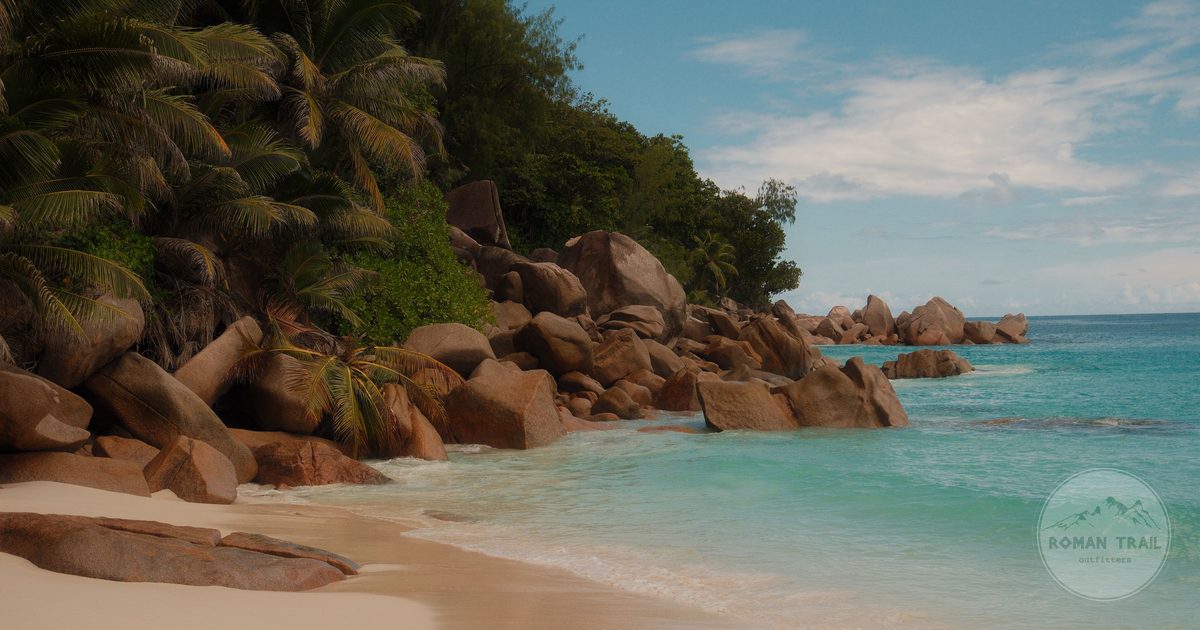 Granite boulders and turquoise water on a Seychelles beach