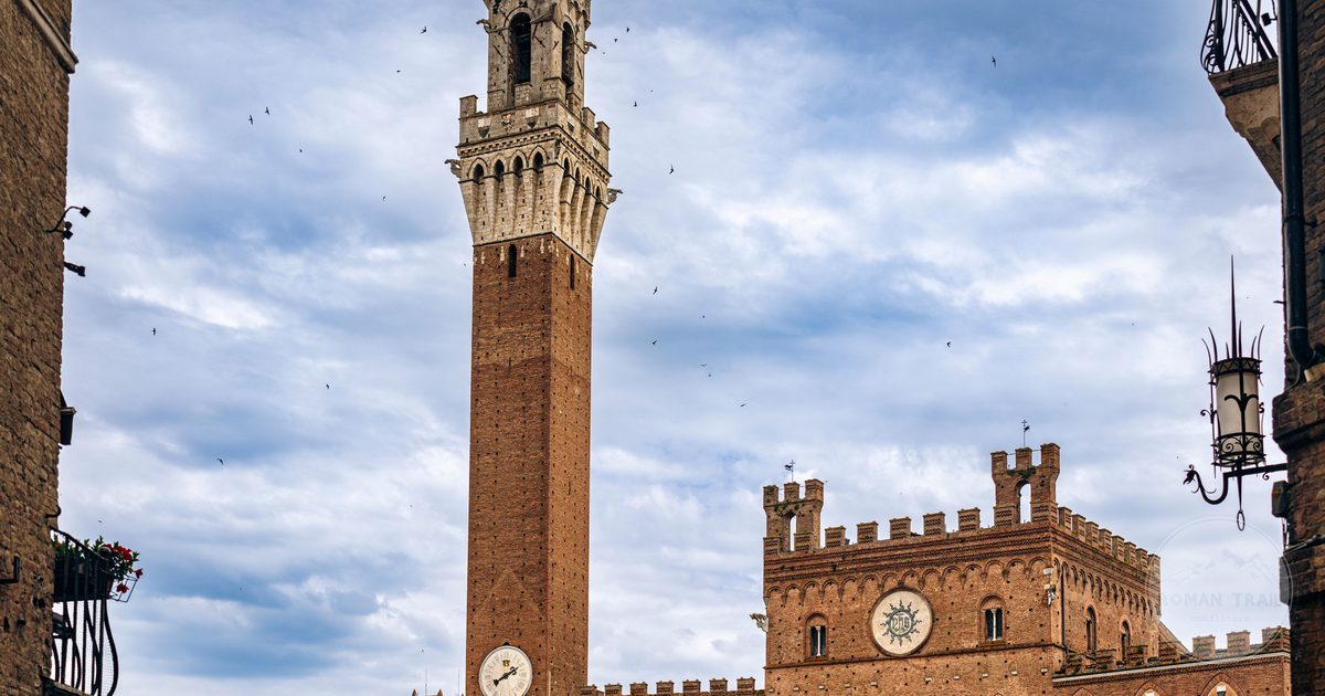 The Torre del Mangia above Piazza del Campo in Siena, Italy