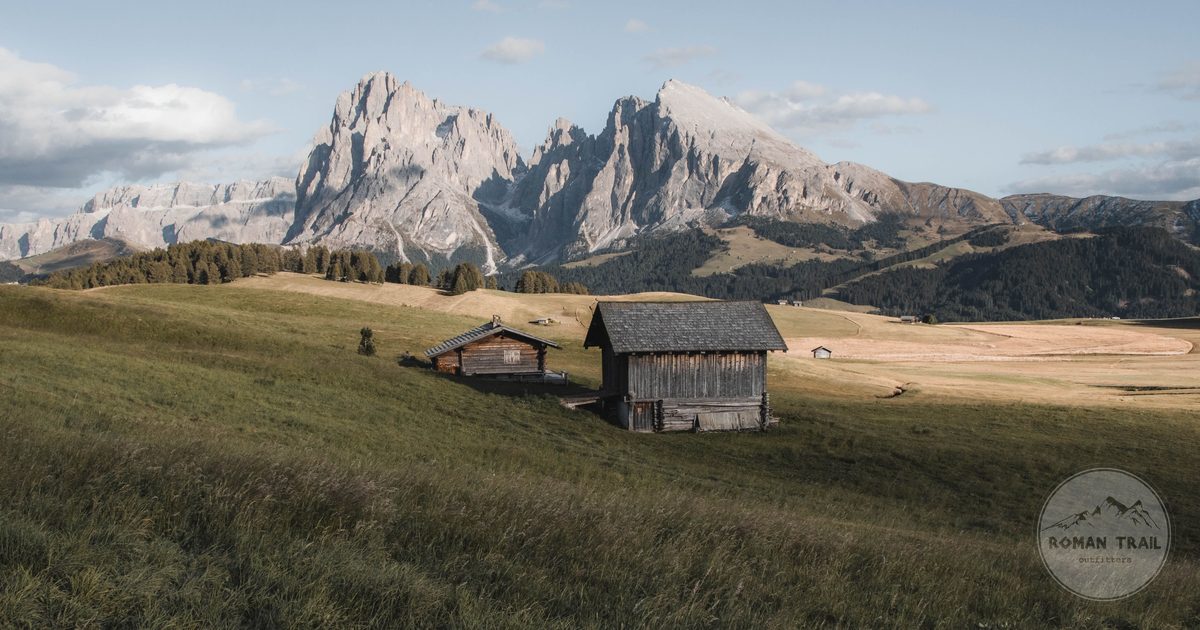 Wooden cabins at Seis am Schlern below the Dolomites, South Tyrol, Italy