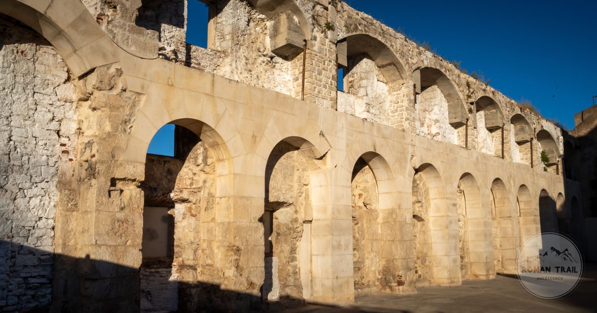 Sunlit Roman ruins and arches in Split, Croatia