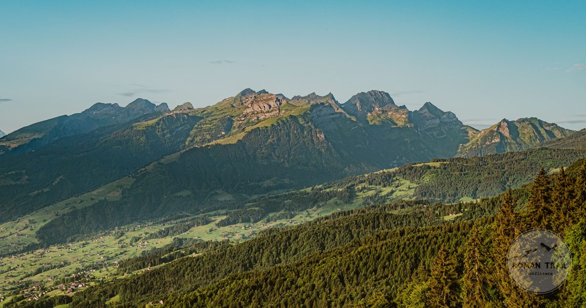 Green valleys and the Alps at Sennwald in canton St Gallen, Switzerland