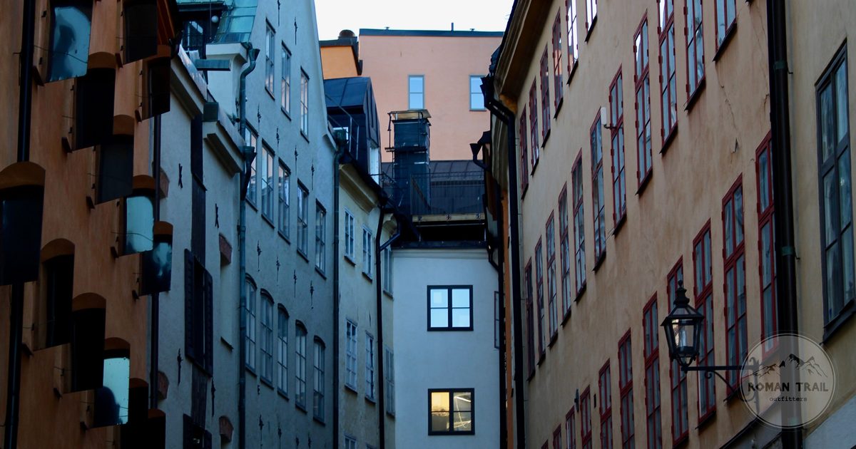 Narrow pastel lane of tall old houses in Gamla Stan, Stockholm for women travelers