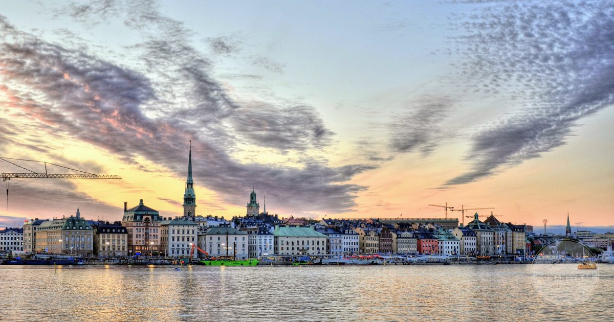Coloured waterfront facades of Gamla Stan seen across the water, Stockholm for women travelers