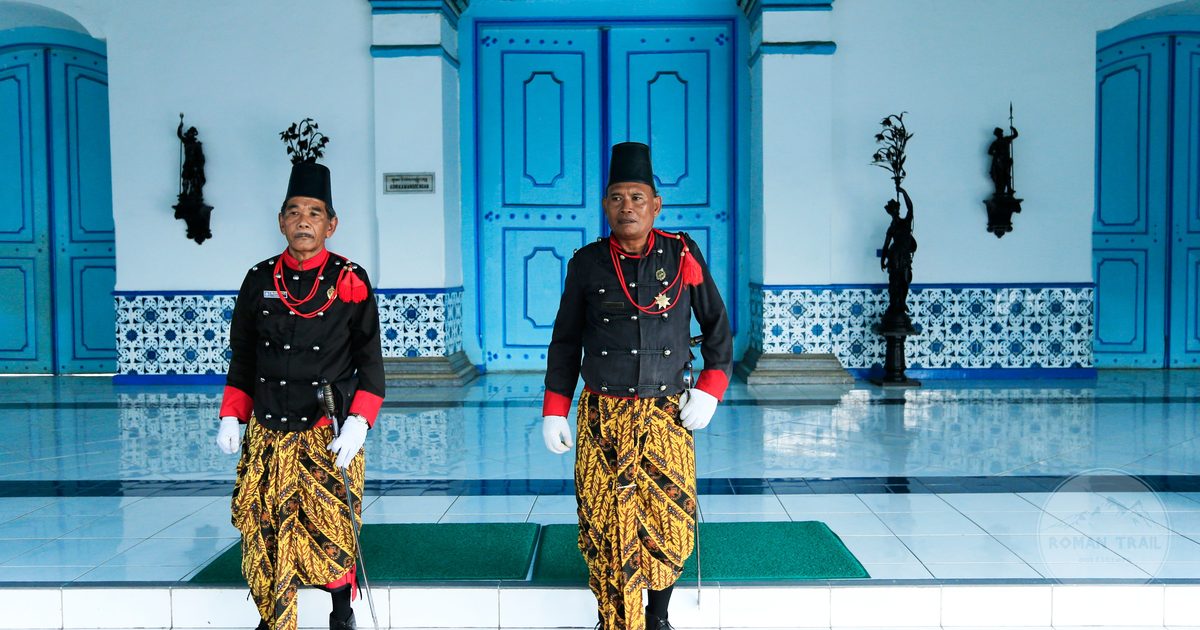 Guards in traditional uniform at the royal palace entrance, Surakarta, Indonesia