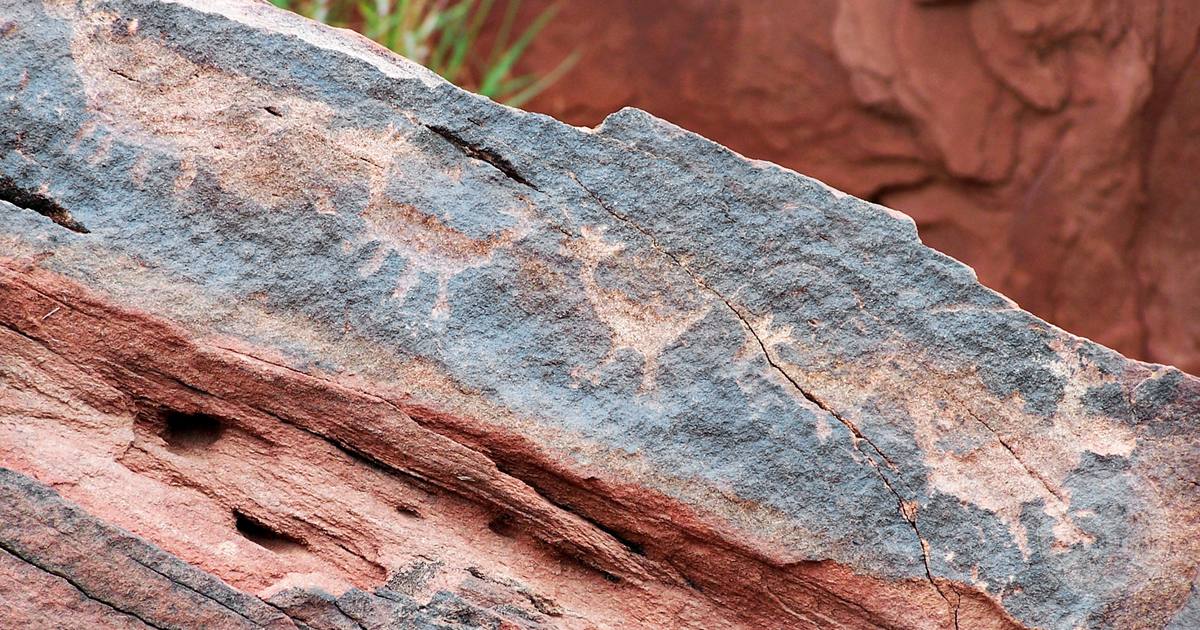 Ancient petroglyphs carved into rock in La Rioja, Argentina