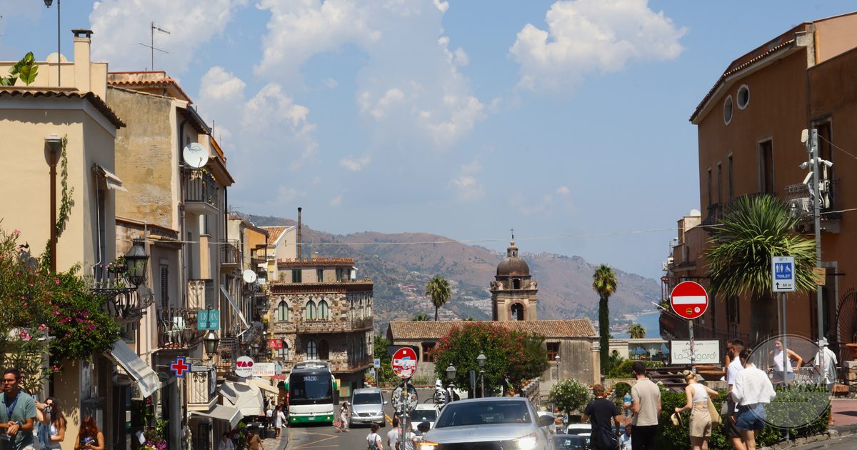 Visitors on the streets of Taormina on a sunny day, Sicily