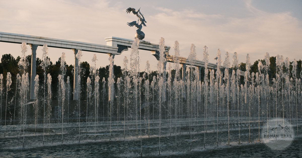 The Independence Square fountain in Tashkent, Uzbekistan, at dusk