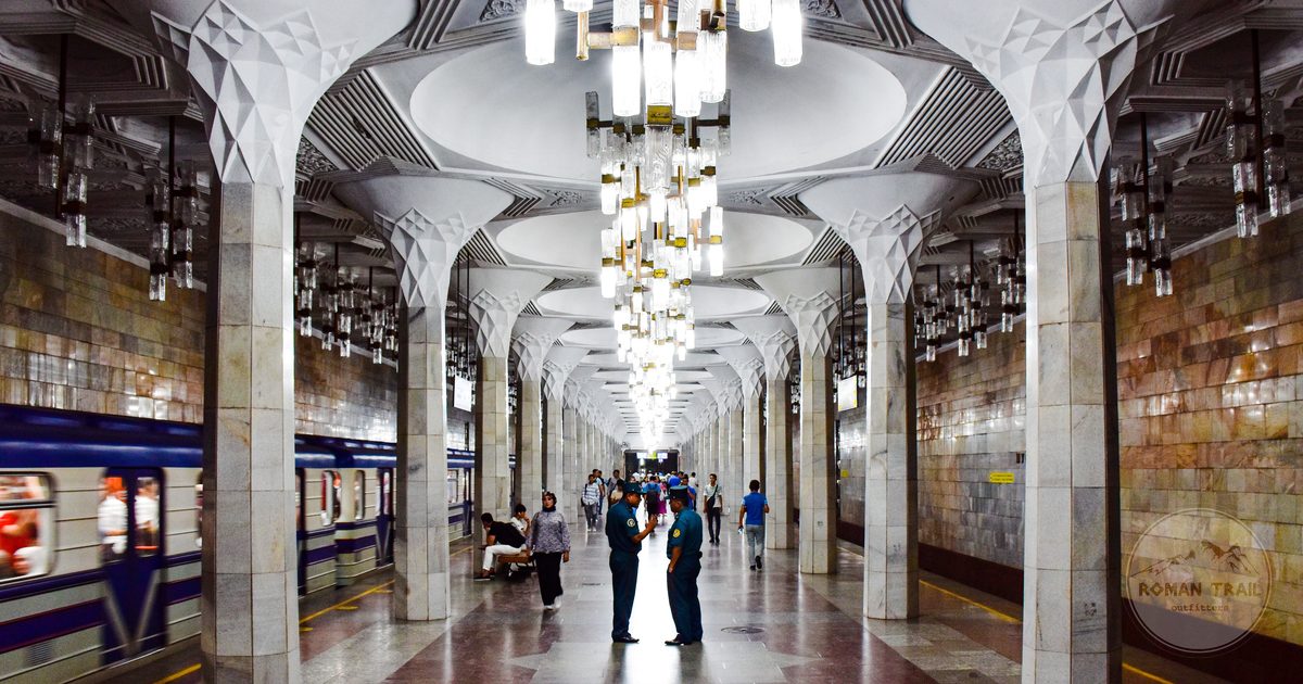 Commuters at Mustakillik Maydoni metro station in Tashkent, Uzbekistan