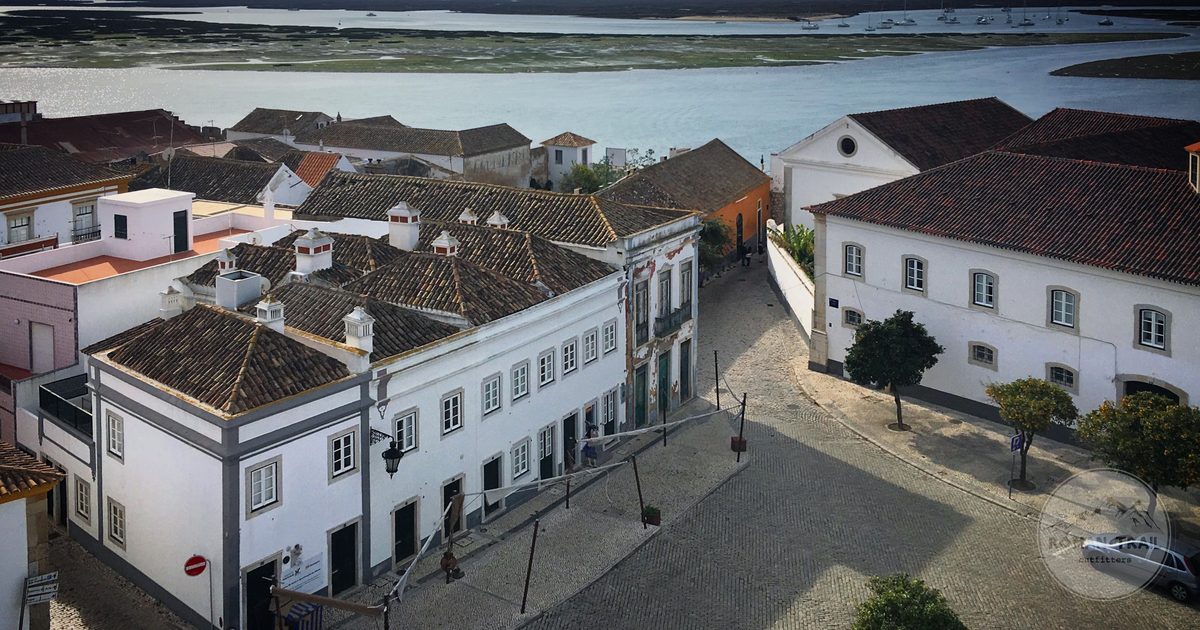 Historic buildings beside the river at Tavira, Portugal