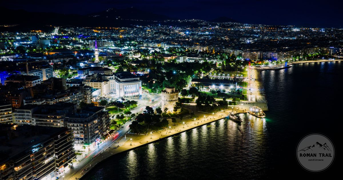 The illuminated Thessaloniki waterfront and White Tower at night, Greece