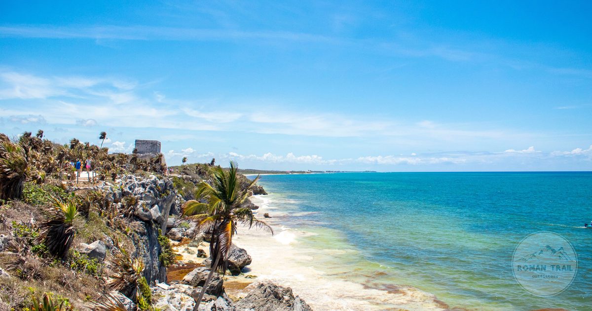 Turquoise water and white sand on the beach at Tulum, Mexico