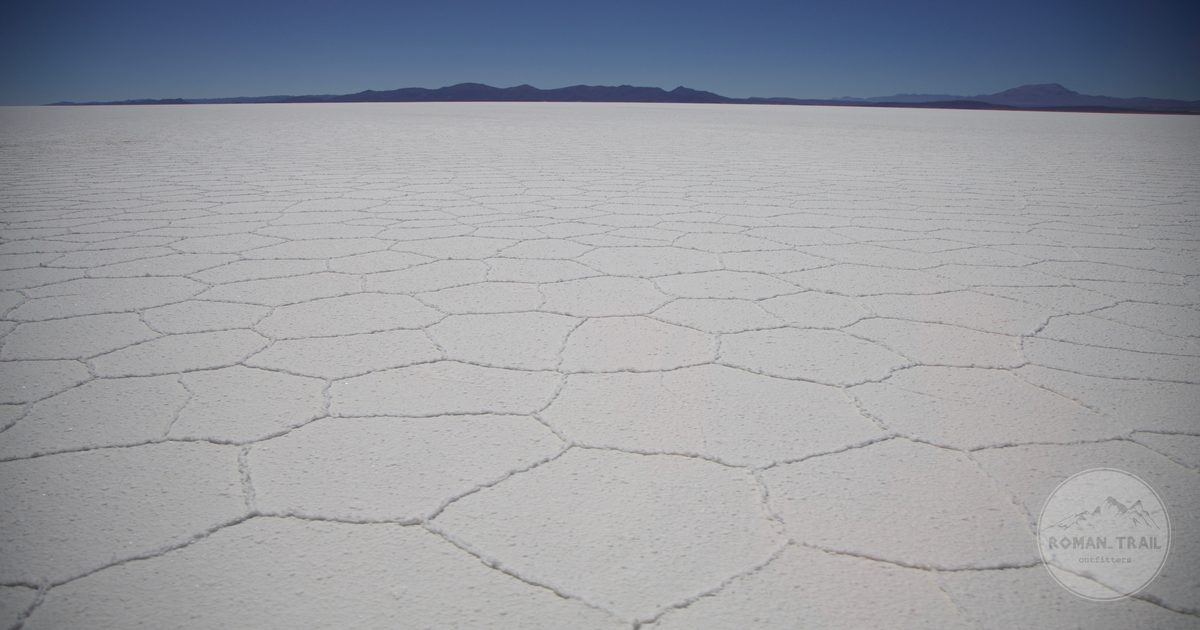 The vast expanse of the Salar de Uyuni under clear skies, Bolivia