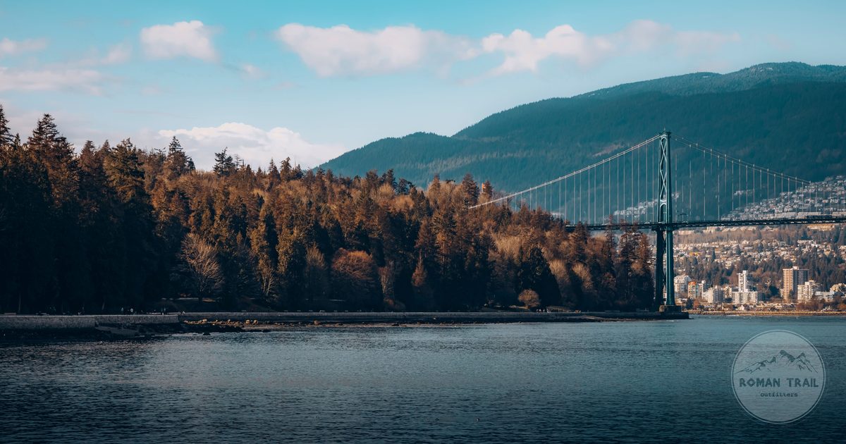 Lions Gate Bridge framed by Stanley Park forest with the North Shore Mountains behind, Vancouver for women travelers