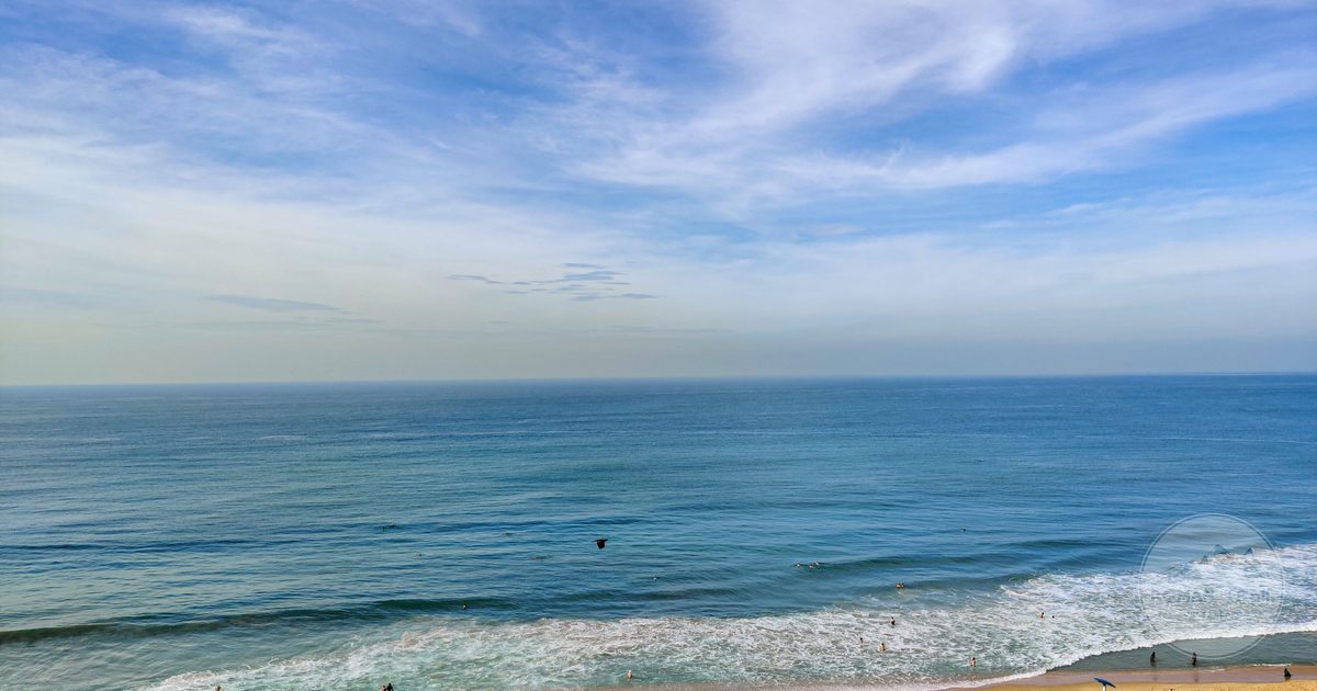 Sandy beach and turquoise water at Varkala, Kerala, India