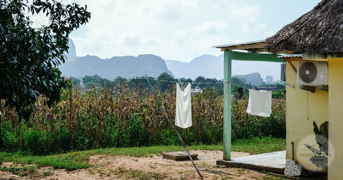 Cornfields and a rustic house with laundry drying at Vinales, Cuba