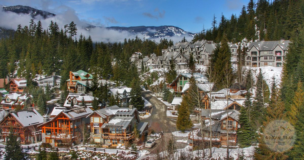 A snowy village among conifers at Whistler, British Columbia