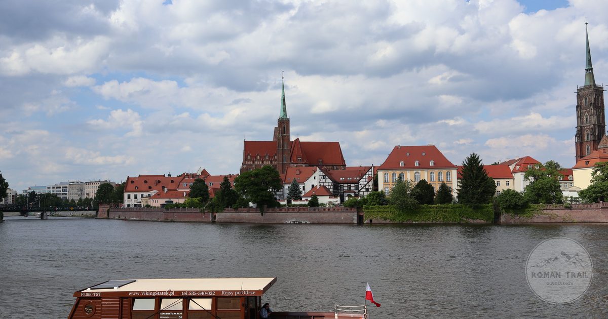 A boat on the Odra river beside Cathedral Island in Wroclaw, Poland