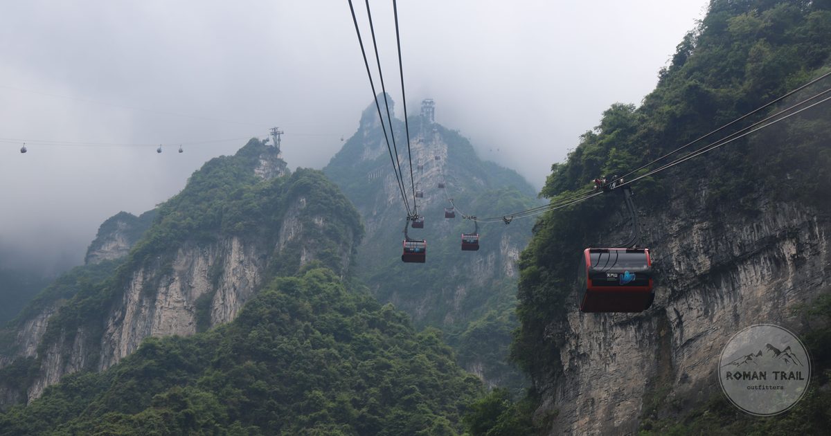 Cable cars rising through cloud on Tianmen Mountain at Zhangjiajie, China